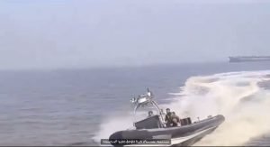 A speedboat collided with a ferry at sea